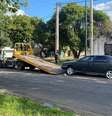 A polícia divulgou imagem do carro começando a ser guinchado  Foto: Divulgação/Policía de Córdoba