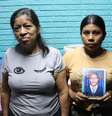 Fredy Orlando Guzmán (na foto ao centro) foi preso injustamente, segundo seus familiares  Foto: Roberto Valencia / BBC News Brasil