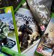 Microsoft continuará oferecendo cópias físicas de seus jogos, ao menos por enquanto  Foto: Reprodução / Pure Xbox