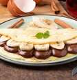 Crepioca recheada com banana e chocolate  Foto: RoYam | Shutterstock / Portal EdiCase