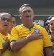 Jair Bolsonaro, ao centro, ao lado de Silas Malafaia e Michelle Bolsonaro em ato convocado em meio às investigações de um golpe de Estado  Foto: Taba Benedicto/Estadão / Estadão