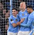  Foto: Oli Scarff/AFP via Getty Images - Legenda: Erling Haaland comemora o gol marcado na vitória sobre o Copenhagen - / Jogada10