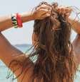 Proteger o cabelo do sol é importante para não danificar os fios  Foto: Shutterstock / Alto Astral