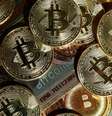 O bitcoin é uma moeda digital descentralizada e que não necessita de terceiros para funcionar.  Foto: Reprodução/Reuters