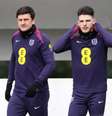  Foto: Divulgação / England - Legenda: Harry Maguire (E) durante treinamento da seleção inglesa - / Jogada10