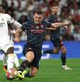  Foto: Pierre-Philippe Marcou/AFP via Getty Images - Legenda: Bernardo Silva (mais à esquerda) recebe a celebração dos companheiros do City pelo gol que marcou logo aos dois minutos / Jogada10