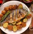 Tambaqui assado com batata  Foto: wideonet | Shutterstock / Portal EdiCase