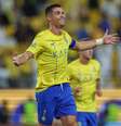 Cristiano Ronaldo comemora um de seus gols no jogo entre Al-Nassr e Al-Wehda   Foto: Yasser Bakhsh | Getty Images / Esporte News Mundo