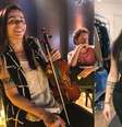 Nathália Rodrigues afirma ter sido impedida de usar banheiro feminino durante gravação de série da Globo  Foto: Reprodução/Instagram/@nathaliaviolin