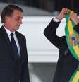 Jair Bolsonaro durante a sua posse, em 2019, quando recebeu a faixa de Michel Temer  Foto: Wilton Junior/Estadão / Estadão