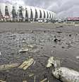 Vista do entorno do Estádio Beira-Rio, onde o alagamento baixou, nesta segunda-feira, 13, no bairro Praia de Belas, ao lado da orla do Guaíba, em Porto Alegre.  Foto: MAX PEIXOTO/DIA ESPORTIVO/ESTADÃO CONTEÚDO