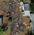 Imagem de drone mostra restos deixados pela enchente em Serraria, em Porto Alegre, Rio Grande do Sul. (14/05/2024)  Foto: REUTERS/Diego Vara