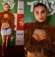 Sasha Meneghel causa de minissaia jeans e bolero de franjas decotado no São João da Thay; Veja fotos do look!.  Foto: Brazil News / Purepeople