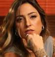 Tati Dias participou de duas temporadas do reality show "De Férias com o Ex", da MTV, e de "A Fazenda", da Record TV, em 2019  Foto: Reprodução: Instagram/tatiidias