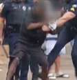 Guarda municipal agride homem em situação de rua no centro de São Paulo.  Foto: Reprodução/TV Globo