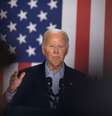 Joe Biden com bandeira dos EUA ao fundo  Foto: Scott Olson/Getty Images / BBC News Brasil