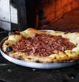 A pizza castelões é assada em forno a lenha centenário  Foto: Leo Martins/Estadao / Estadão