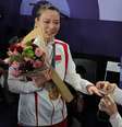 Liu Yuchen foi pedida em casamento por Huang Ya Qing após pódio em Paris  Foto: REUTERS/Ann Wang