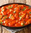 Frango com molho de tomate  Foto: AS Foodstudio | Shutterstock / Portal EdiCase