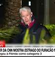 Anderson Copper lutou contra o vento e chuva para fazer o 'ao vivo' na CNN  Foto: Reprodução/TV