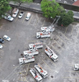 Pátio da Enel com carros e caminhões estacionados  Foto: Reprodução/Redes Sociais