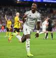  Foto: Denis Doyle/Getty Images - Legenda: Vini Jr comemora um dos gols da vitória sobre o Borussia Dortmund / Jogada10
