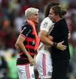  Foto: Gilvan de Souza/CRF - Legenda: Filipe Luís é destaque na imprensa internacional / Jogada10