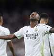  Foto: Divulgação / Real Madrid - Legenda: Vini Jr em ação com a camisa do Real Madrid pela Champions League / Jogada10