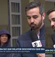O repórter Guilherme Pimentel no momento em que foi atrapalhado por uma mulher pedindo comida  Foto: Reprodução/TV
