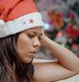 Mulher ansiosa na festa de Natal.  Foto: Freepik