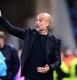  Foto: Christian Bruna/Getty Images - Legenda: Pep Guardiola vai permanecer no City / Jogada10