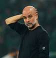 Pep Guardiola.   Foto: Gualter Fatia/Getty Images / Esporte News Mundo