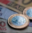Notas e moedas de real  Foto: Getty Images / BBC News Brasil