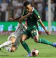 Foto: Cesar Greco/Palmeiras/by Canon - Legenda: Guilherme e Giay em duelo no Santos x Palmeiras / Jogada10