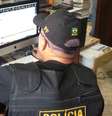 PF apreende computador, celular e mídias de compartilhamento de idoso suspeito  Foto: Divulgação/Polícia Federal 