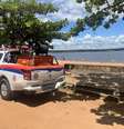 Funcionários da Prefeitura em trabalho na Represa do Broa  Foto: Prefeitura de Itirapina / Reprodução