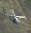 Piloto de helicóptero da polícia foi atingido na cabeça  Foto: Reprodução/GloboNews