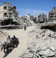Ruínas na Cidade de Gaza, em imagem desta terça-feira, 20 de maio de 2025.  Foto: REUTERS - Mahmoud Issa / RFI