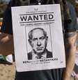 Cartaz mostra o rosto do premiê israelense em manifestação pró-Gaza  Foto: ANSA / Ansa - Brasil
