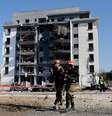 Soldados israelenses caminham em local atingido por ataque iraniano em Be'er Sheva 20/06/2025  Foto: REUTERS/Amir Cohen