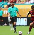  Foto: Gilvan de Souza /CRF - Legenda: Arrascaeta na partida contra o Bayern de Munique / Jogada10