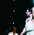 None  Foto: Freddie Mercury no Live Aid em 1985 ( Steve Rapport/Getty Images) / Rolling Stone Brasil