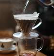 Com a tarifa de 50% para produtos brasileiros, o preço do café deve ficar ainda mais caro para o consumidor americano. Foto de ilustração no Rio de Janeiro, em 10/7/25.  Foto: REUTERS - Pilar Olivares / RFI