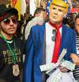 Manifestantes protestam contra falas de Trump na rua 25 de março, em São Paulo  Foto: EDI SOUSA/ATO PRESS / Estadão