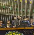 Parlamentares da oposição usam fitas adesivas na boca durante protesto na Câmara  Foto: Deborah Sena 