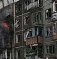 Prédio residencial atingido por um ataque russo na cidade de Bilozerske, na região de Donetsk, em 12 de agosto de 2025.  Foto: © AFP - GENYA SAVILOV / RFI