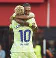  Foto: Rafa Babot/Getty Images - Legenda: Raphinha e Lamine Yamal estão entre os candidatos à Bola de Ouro / Jogada10