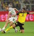 Dean Mouhtaropoulos/Getty Images - Legenda: Borussia Dortmund conquistou importante vitória em casa  Foto: Jogada10