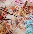 Quanto rende em dividendos R$ 50 mil em FIIs de tijolo?  Foto: Suno