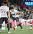  Foto: Marcelo Gonçalves/Fluminense - Legenda: Otávio em ação na eliminação do Fluminense para o Lanús / Jogada10